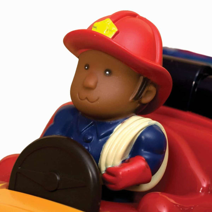 Toy fire truck with firefighters