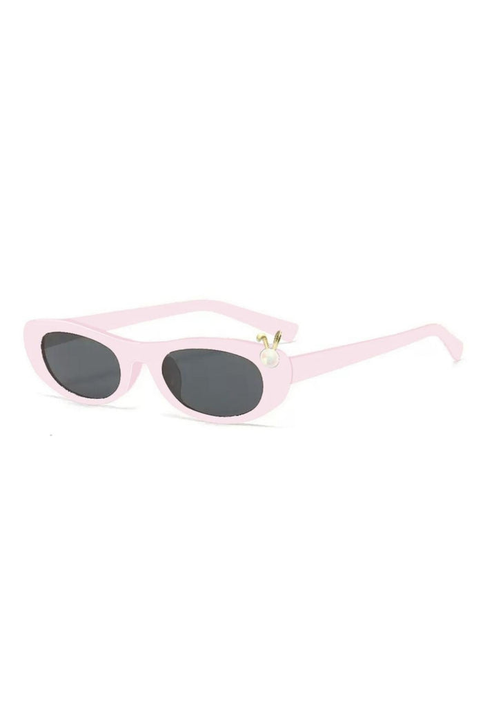 Frame Shape: Cat Eye
Color: Black
UV Protection
Material: Polycarbonate
Special Detail: Pearl Bunny Charm with Gold Ears