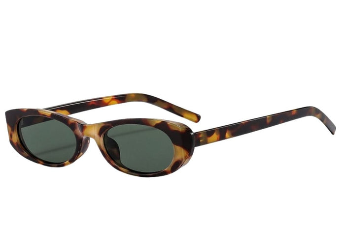 A slim, minimal frame Sunglasses with tortoiseshell frame and dark lenses