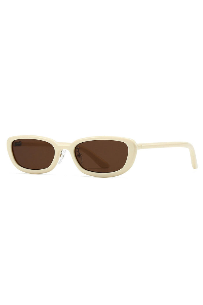 Beige sunglasses with brown lenses