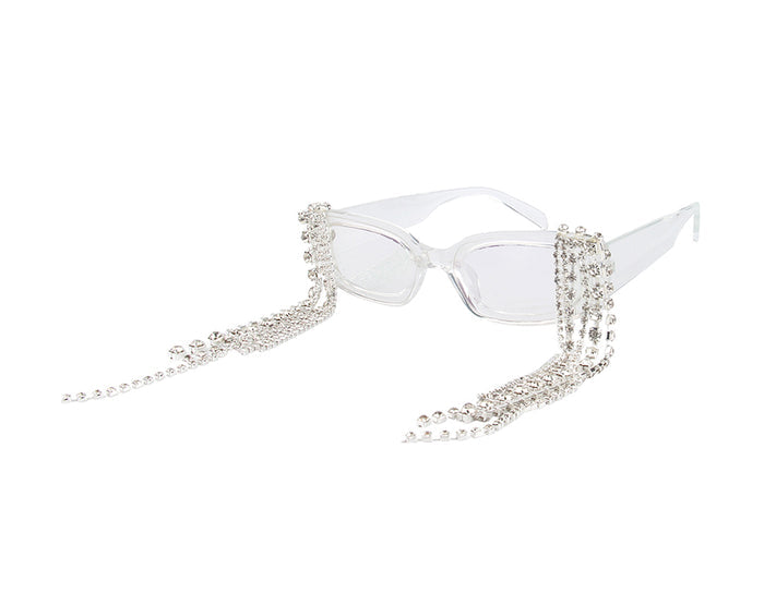 Clear cat-eye sunglasses with a rhinestone