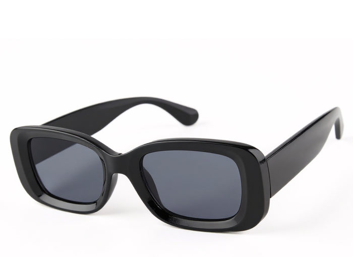 A bold black square frame that commands attention while staying effortlessly chic.