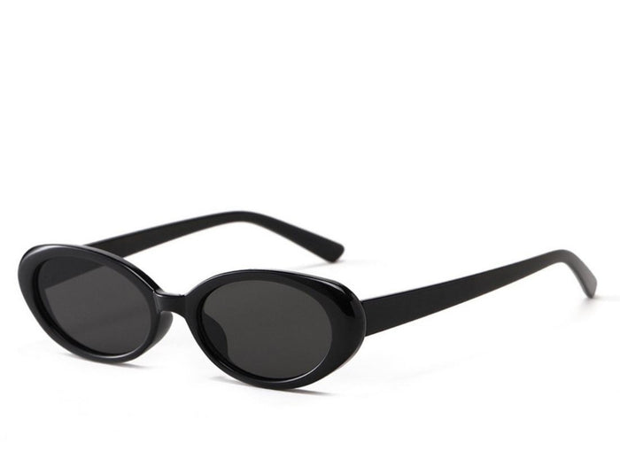 Slim black small-frame silhouette with full UV protection