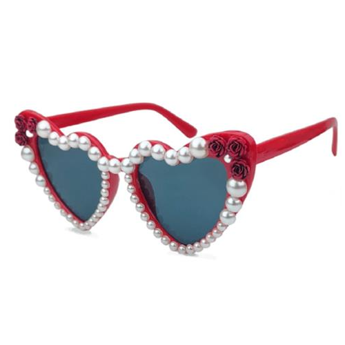 Red sunglasses with heart-shaped lenses and pearl embellishments