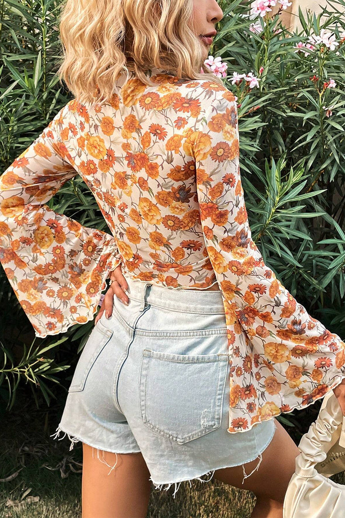 Women’s Orange Floral Blouse with Bell Sleeves, Mock Neck, and Scalloped Trim